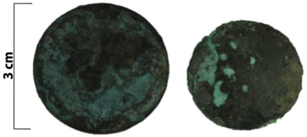 The bronze penny (left) and half-penny (right) recovered from Grubb cottage.