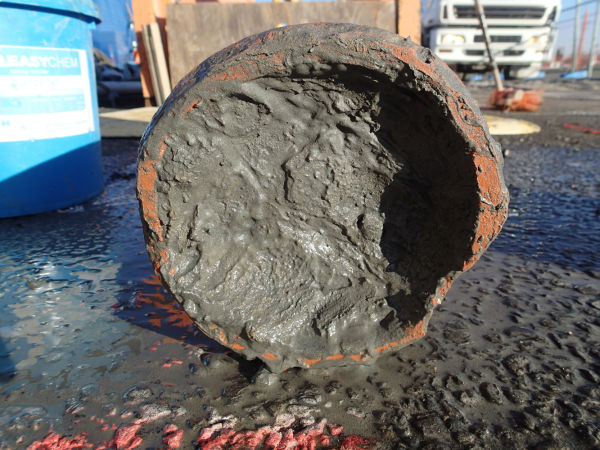 Not surprisingly, when we removed one of these pipes it was choked with liquefaction silt. Image: Hamish Williams.